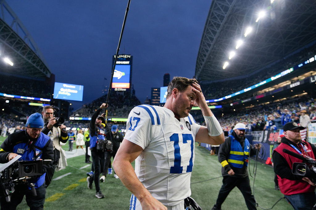 Indianapolis Colts quarterback Philip Rivers (17) leaves the field after an NFL football game against the Seattle Seahawks, Sunday, Dec. 14, 2025, in Seattle. (AP Photo/Stephen Brashear)