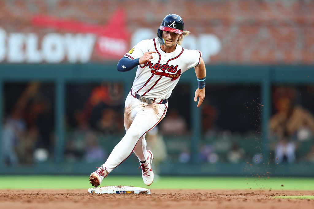 Atlanta Braves' Jim Jarvis rounds second base in the second inning of a baseball game against the San Diego Padres, Wednesday, July 22, 2026, in Atlanta. (AP Photo/Colin Hubbard)