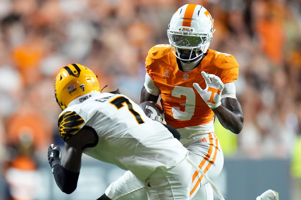 Tennessee wide receiver Radarious Jackson (3) runs against Kennesaw State defensive back Luke Evans (7) during the first half of an NCAA college football game Saturday, Sept. 19, 2026, in Knoxville, Tenn. (AP Photo/Camden Hall)