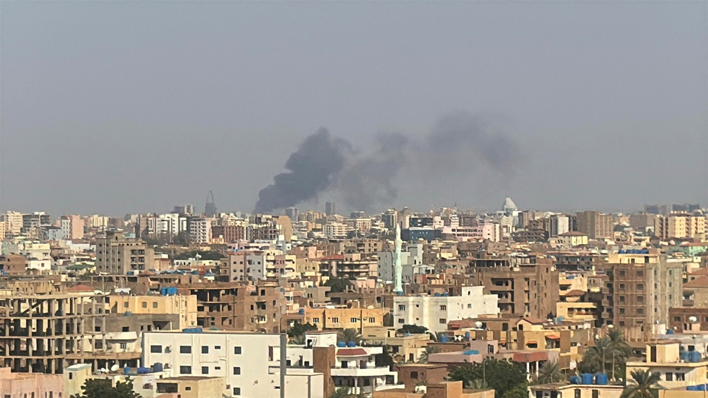 FILE - This grab from video shows smoke rising over Khartoum, Sudan, Sept. 26, 2024, after Sudan's military started an operation to take areas of the capital from its rival, the paramilitary Rapid Support Forces. (AP Photo/Rashed Ahmed, File)