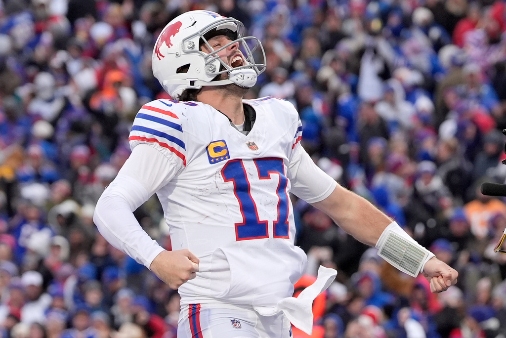 Buffalo Bills quarterback Josh Allen celebrates after scoring a touchdown against the Tampa Bay Buccaneers during the second half of an NFL football game, Sunday, Nov. 16, 2025, in Orchard Park, N.Y. (AP Photo/Carolyn Kaster)