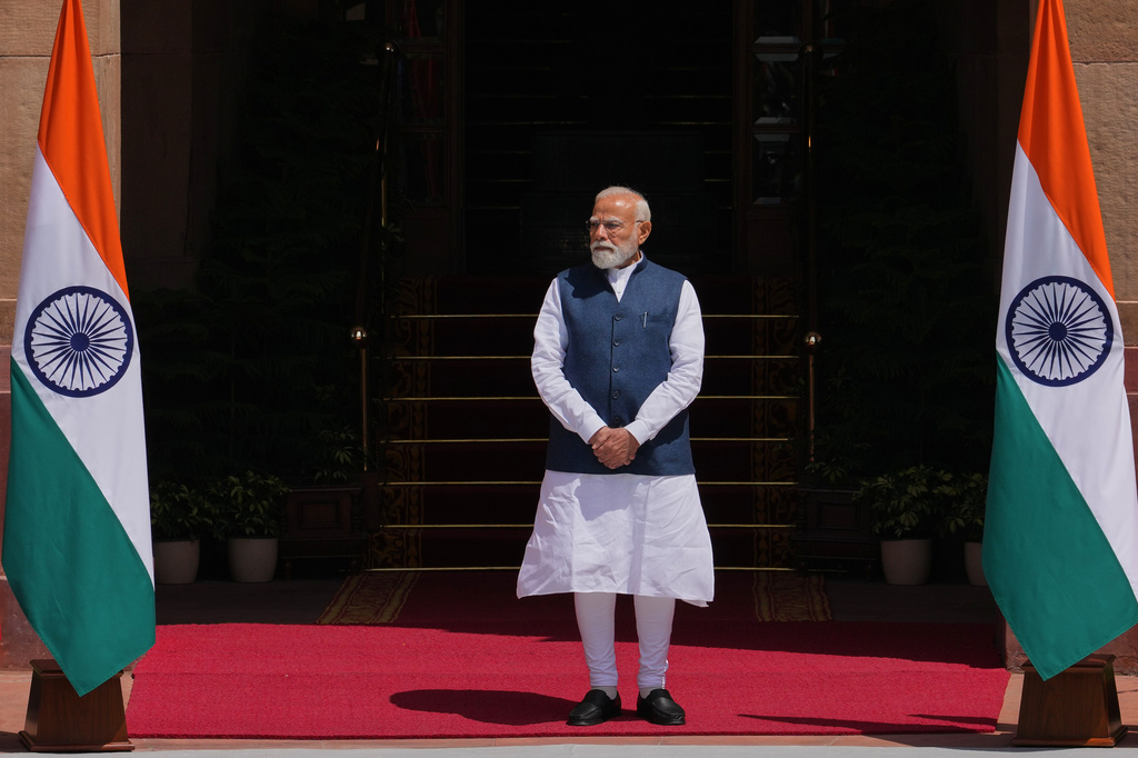 Indian Prime Minister Narendra Modi, arrives to receive Austrian Chancellor Christian Stocker for their delegation-level meeting in New Delhi, India, Thursday, April 16, 2026. (AP Photo/Manish Swarup)