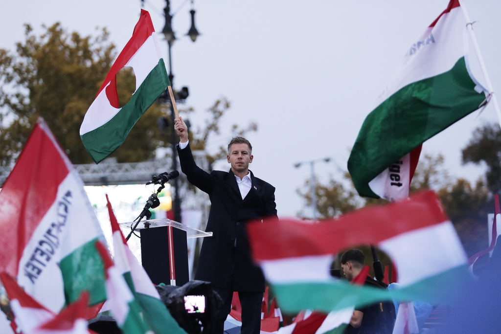 The leader of the Hungarian opposition TISZA party, Peter Magyar, during a demonstration marking the 69th anniversary of the outbreak of Hungary's 1956 revolution against communist rule and the Soviet Union, in Budapest, Hungary, Thursday, Oct. 23, 2025. (AP Photo/Rudolf Karancsi)