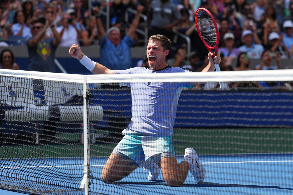 Neal Skupski, of Britain, celebrates with Christian Harrison, of the United States, after winning the men's doubles final of the U.S. Open tennis championships Kevin Krawietz, of Germany, and Tim Puetz, of Germany, Saturday, Sept. 12, 2026, in New York. (AP Photo/Kirsty Wigglesworth)