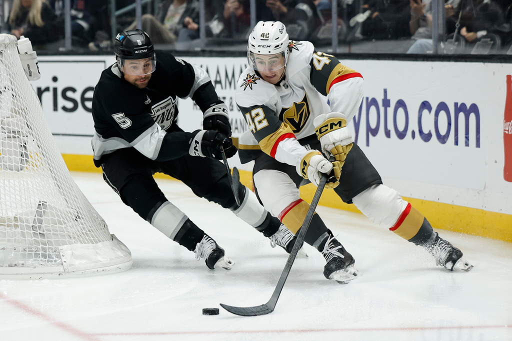 FILE - Vegas Golden Knights right wing Braeden Bowman (42) skates with the puck as Los Angeles Kings defenseman Cody Ceci (5) defends during the third period of an NHL hockey game, Jan. 14, 2026, in Los Angeles. (AP Photo/Caroline Brehman, File)