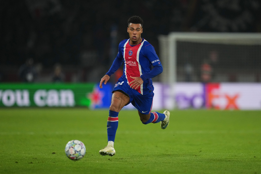 PSG's Desire Doue runs with the ball during the Champions League opening phase soccer match between Paris Saint-Germain and FC Barcelona in Paris, Tuesday, Oct. 20, 2026. (AP Photo/Thibault Camus)