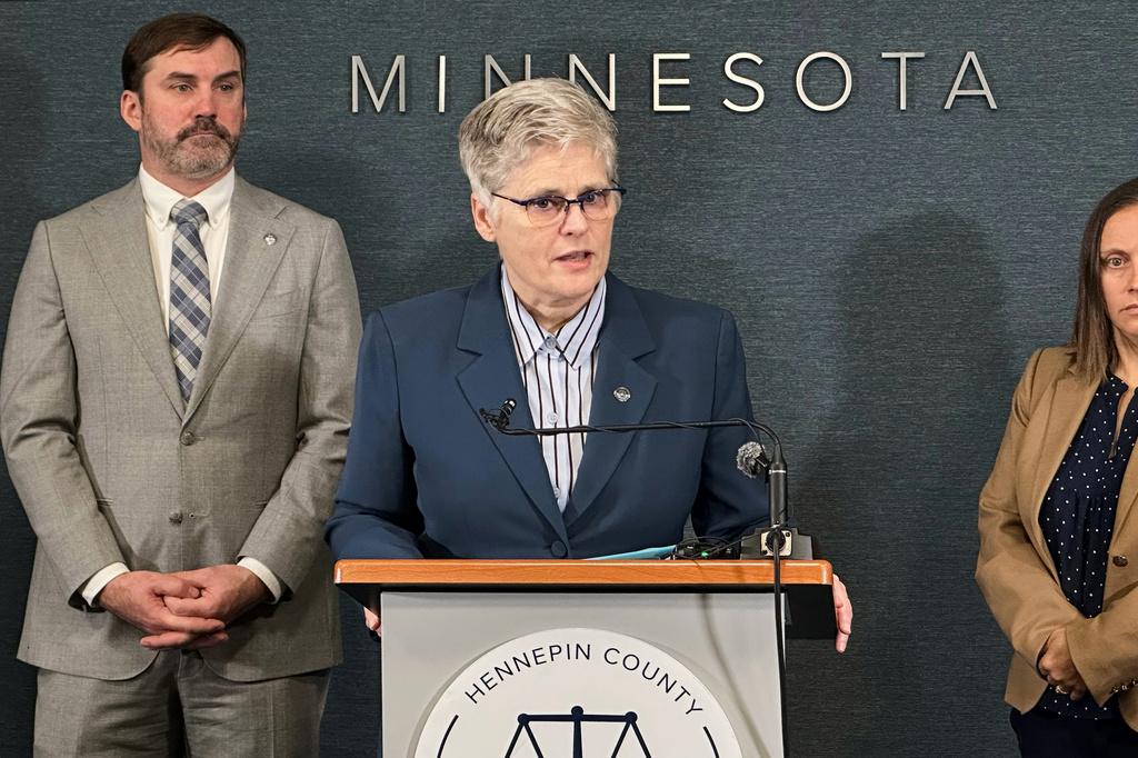 In this photo made with a smartphone, Hennepin County Attorney Mary Moriarty announces charges related to identity theft in the state's primary election Wednesday, Oct. 28, 2026, in Minneapolis. (AP Photo/Mark Vancleave)