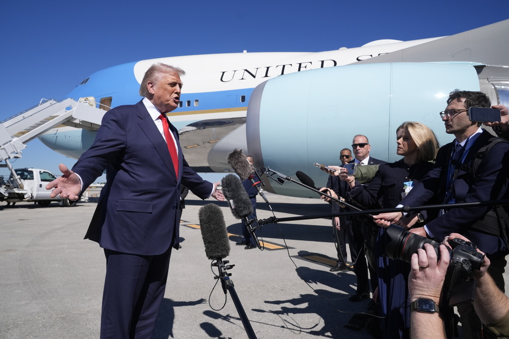President Donald Trump speaks to the media after arriving at Palm Beach International Airport, Friday, Oct. 31, 2025, in West Palm Beach, Fla. (AP Photo/Manuel Balce Ceneta)
