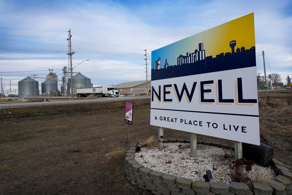 A sign on the edge of town welcomes visitors to Newell, Iowa, Jan. 6, 2026. (AP Photo/Charlie Neibergall)