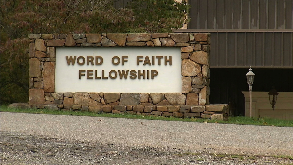 FILE - This 2016 image from video shows the entrance to the Word of Faith Fellowship church in Spindale, N.C. (AP Photo/Alex Sanz, File)