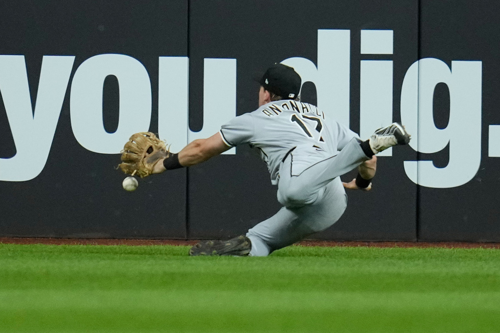 Chicago White Sox left fielder Sam Antonacci (17) can't get to the ball on a game winning double hit by Cleveland Guardians' Brayan Rocchio in the ninth inning of a baseball game in Cleveland, Tuesday, Sept. 15, 2026. (AP Photo/Sue Ogrocki)