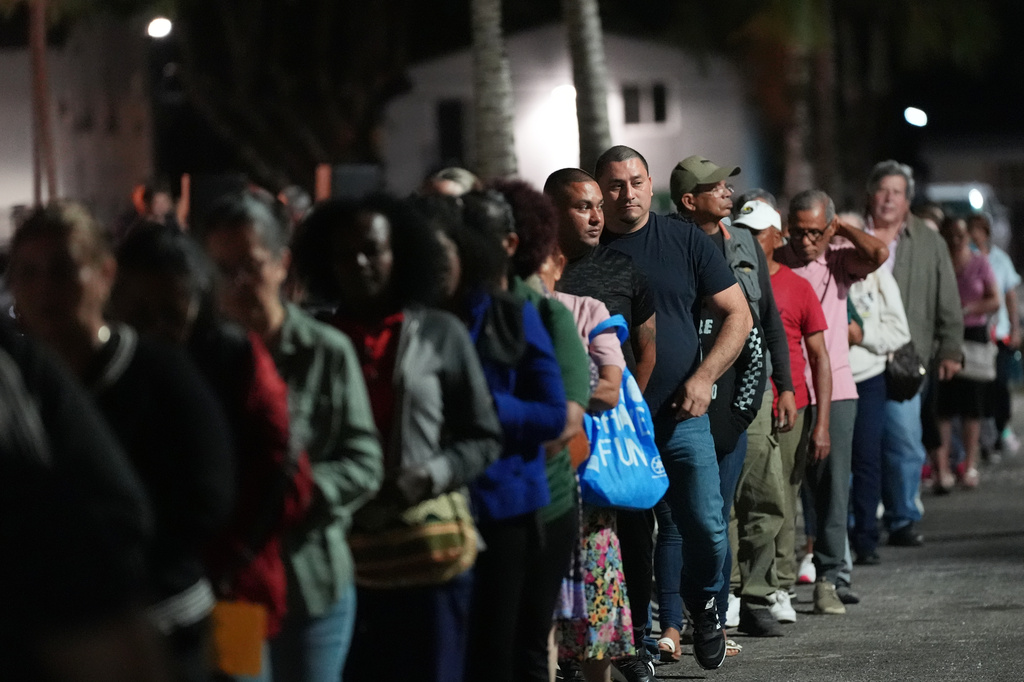 Corpus Christi Catholic Church members participate in a rehearsal for their Good Friday procession Monday, March 23, 2026, in Miami, Fla. (AP Photo/Marta Lavandier)