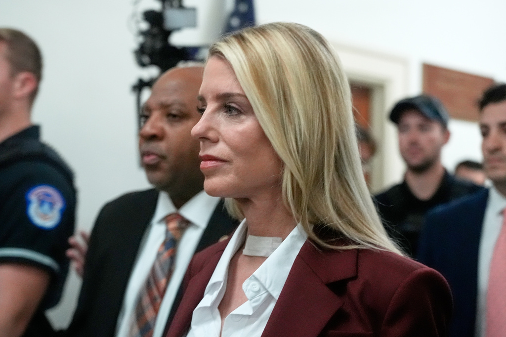 Former Attorney General Pam Bondi arrives for her deposition at the Rayburn House Office Building on Capitol Hill, Friday, May 29, 2026, in Washington. (AP Photo/Manuel Ceneta)