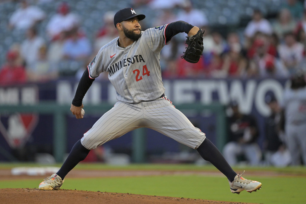 Minnesota Twins starting pitcher Simeon Woods Richardson delivers during the first inning of a baseball game against the Los Angeles Angels, Monday, Sept. 8, 2025, in Anaheim, Calif. (AP Photo/Jayne Kamin-Oncea)