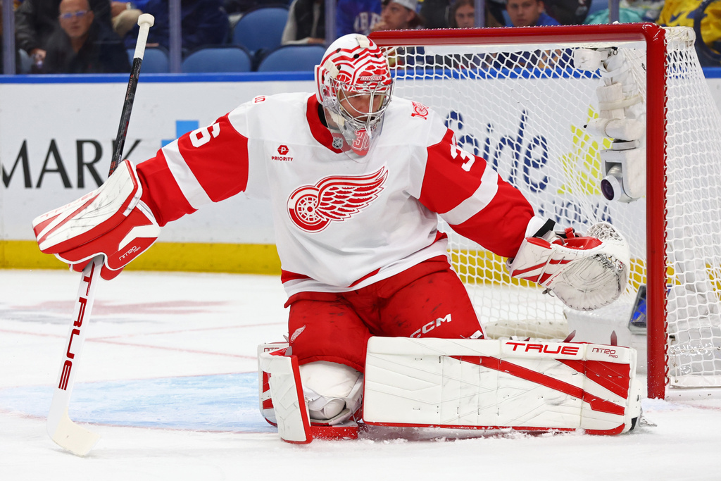 Detroit Red Wings goaltender John Gibson (36) watches the puck go wide during the first period of an NHL hockey game against the Buffalo Sabres, Wednesday, Oct. 22, 2025, in Buffalo, N.Y. (AP Photo/Jeffrey T. Barnes)