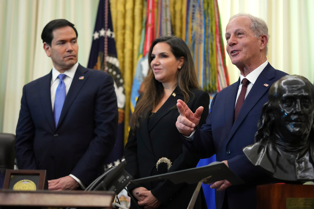 U.S. Ambassador to Lebanon Michel Issa, right, speaks as Secretary of State Marco Rubio and Lebanese Ambassador to the U.S. Nada Hamadeh Moawad, listen during a meeting between the ambassadors of Israel and Lebanon in the Oval Office at the White House, Thursday, April 23, 2026, in Washington. (AP Photo/Mark Schiefelbein)