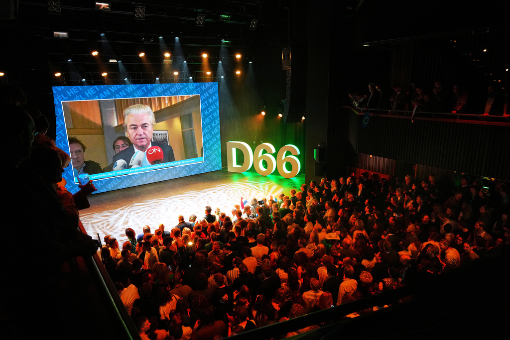 Far-right anti Islam lawmaker Geert Wilders is seen on a large screen, at an election venue for the D66 party, during exit poll results for a general election in Leiden, Netherlands, Wednesday, Oct. 29, 2025. (AP Photo/Peter Dejong)