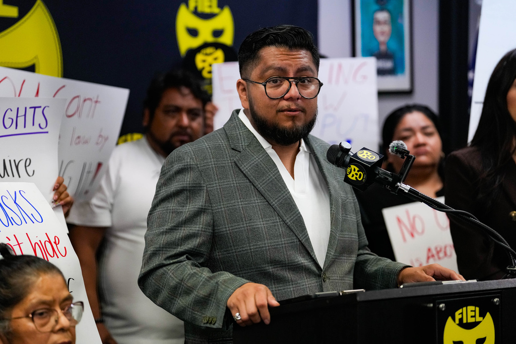 Cesar Espinosa of FIEL speaks during a news conference at FIEL headquarters in Houston on Friday, Oct. 16, 2026, disputing Immigration and Customs Enforcement's account of the Oct. 10 enforcement action that left Miguel Parra with a broken leg. (Raquel Natalicchio /Houston Chronicle via AP)