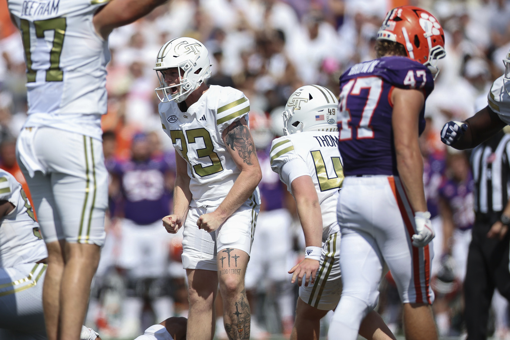 Georgia Tech place kicker Aidan Birr (33) reacts after kicking the game-winning 55-yard field goal in the closing seconds of the second half of an NCAA college football game against Clemson, Saturday, Sept. 13, 2025, in Atlanta. (AP Photo/Colin Hubbard)