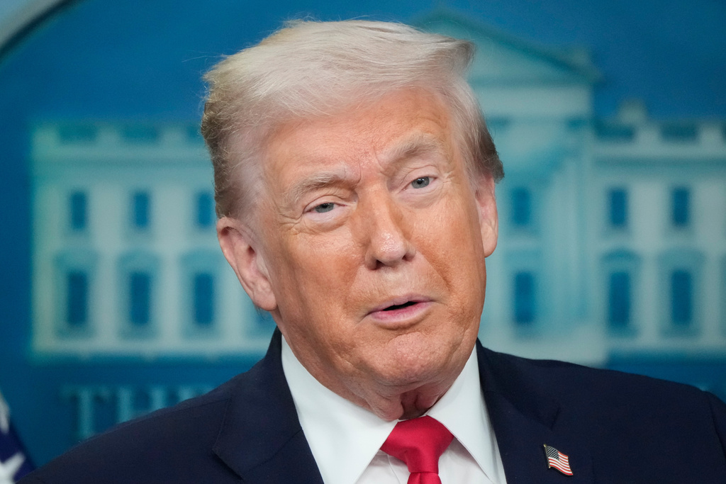 President Donald Trump speaks during a press briefing at the White House in Washington, Tuesday, Jan. 20, 2026. (AP Photo/Mark Schiefelbein)