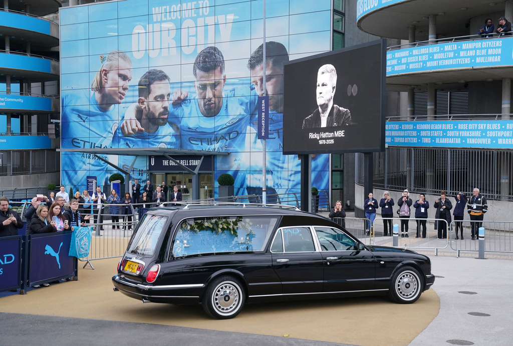 The hearse of former boxing champion , Ricky Hatton arrives at the Etihad Stadium following the funeral earlier at Manchester Cathedral, England, Friday Oct. 10, 2025. (Owen Humphreys/PA via AP)
