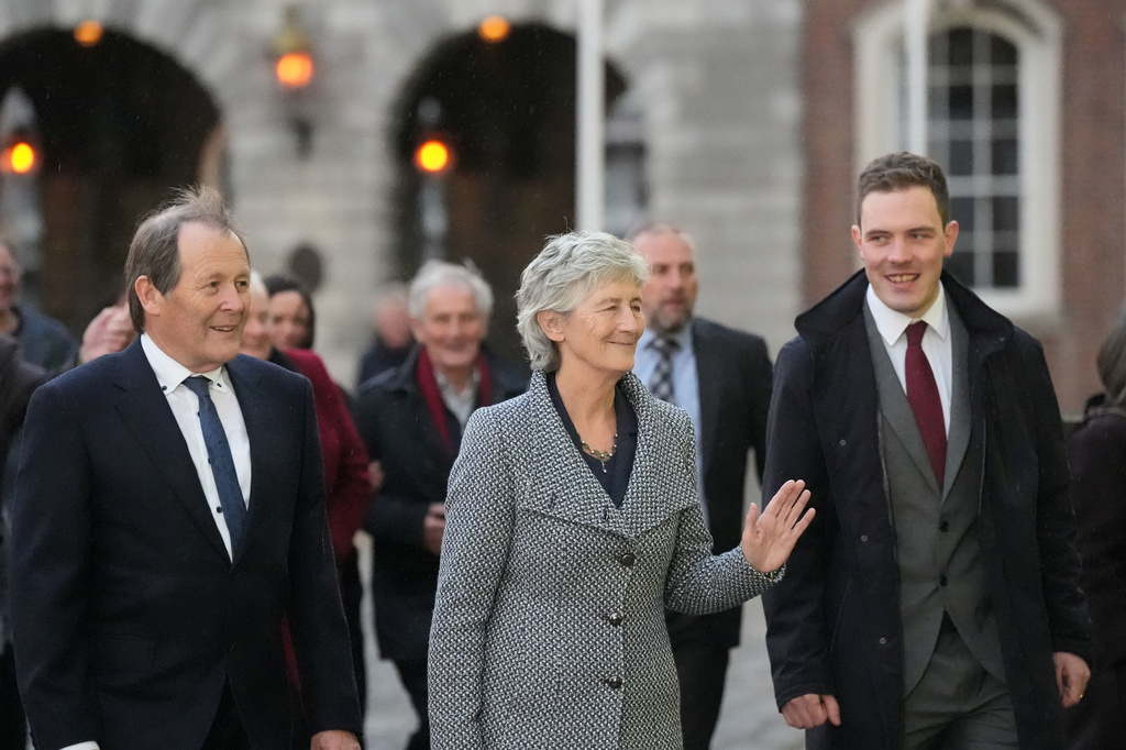 Left-wing independent presidential candidate Catherine Connolly arrives at Dublin Castle for the count in Ireland's presidential election to replace Michael D. Higgins, who has served the maximum two seven-year terms, on Saturday, Oct. 25, 2025. (Niall Carson/PA via AP)