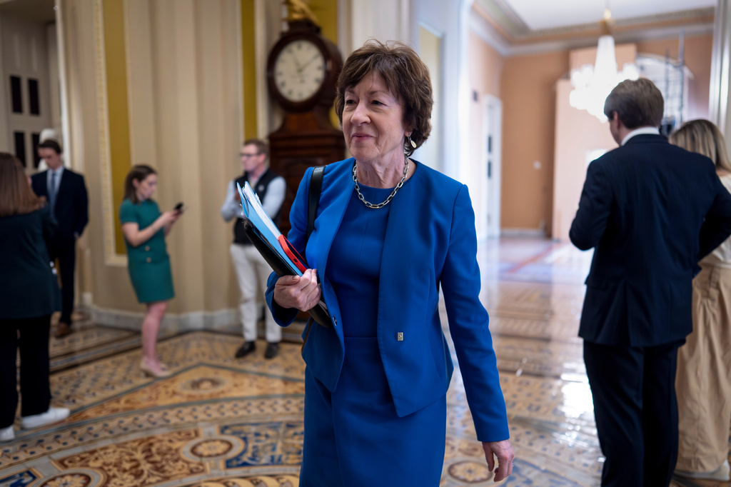 FILE - Senate Appropriations Committee Chair Susan Collins, R-Maine, walks to the chamber after meeting behind closed doors with fellow Republicans on the Homeland Security budget stalemate, at the Capitol in Washington, March 26, 2026. (AP Photo/J. Scott Applewhite, File)
