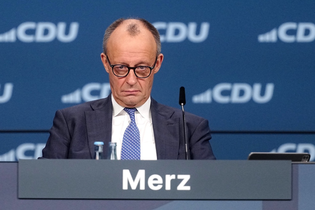 German Chancellor Friedrich Merz, CDU party chairman, attends the CDU federal party conference, in Stuttgart, Germany, Friday Feb. 20, 2026. (Kay Nietfeld/dpa via AP)