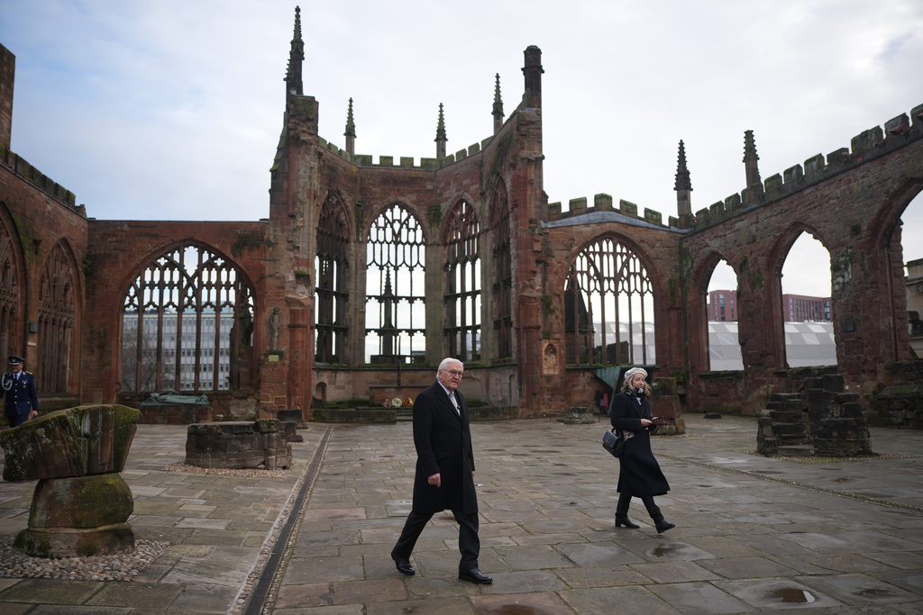 Germany's President Frank-Walter Steinmeier tours the old Coventry Cathedral, in Coventry, England, Friday, Dec. 5, 2025, on the final day of the state visit to the UK. (Christopher Furlong/Pool Photo via AP)