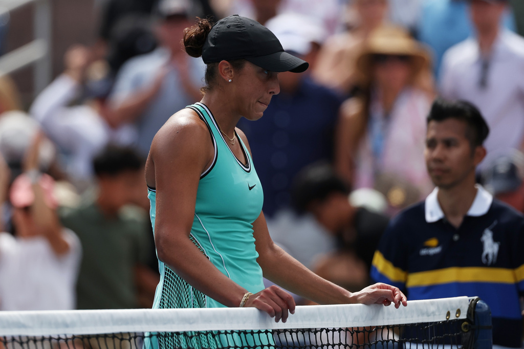 Madison Keys, of the United States, reacts after she lost her match to Zheng Qinwen, of China, during the third round of the U.S. Open tennis championships Saturday, Sept. 5, 2026, in New York. (AP Photo/Heather Khalifa)