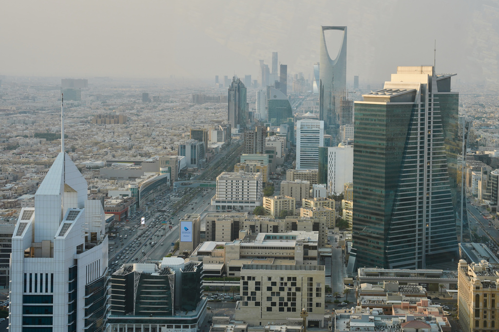 Buildings line King Fahd Road in the Olaya district of Riyadh, Saudi Arabia, Wednesday, Oct. 14, 2026 (AP Photo/Baraa Anwer)