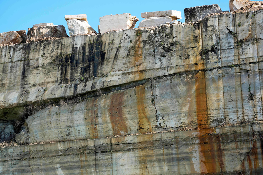A wall of sectioned travertine is seen at the Degemar quarry near Tivoli, Italy, on Friday, Feb. 13, 2026, where 17th-century Baroque architect Gian Lorenzo Bernini selected travertine for the colonnade of St. Peter's Square. (AP Photo/Gregorio Borgia)