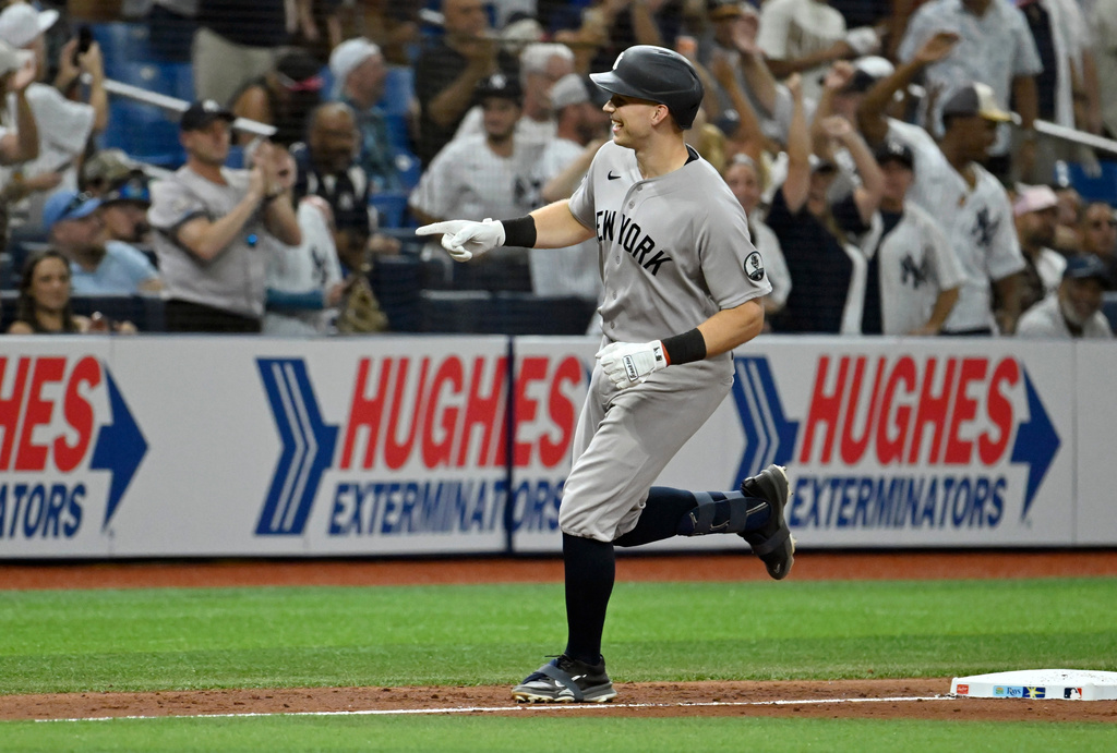 New York Yankees' Ben Rice celebrates as he rounds the bases after his home run during the ninth inning of a baseball game against the Tampa Bay Rays, Monday, July 6, 2026, in St. Petersburg, Fla. (AP Photo/Jason Behnken)
