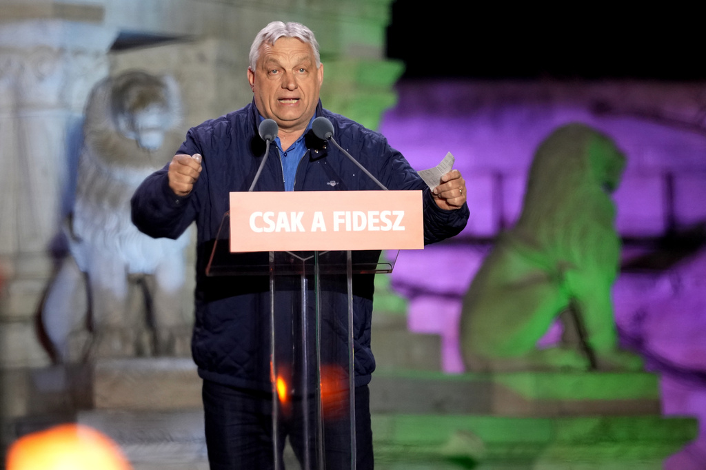 Hungary's Prime Minister Viktor Orban addresses supporters during the electoral campaign closing rally of the governing Fidesz in Budapest, Hungary, Saturday, April 11, 2026. (AP Photo/Petr David Josek)