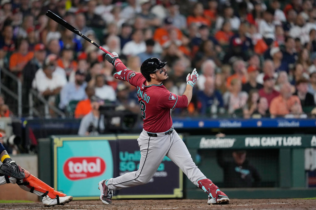 Arizona Diamondbacks' Nolan Arenado hits a two-run home run against the Houston Astros during the third inning of a baseball game Sunday, Sept. 6, 2026, in Houston. (AP Photo/David J. Phillip)