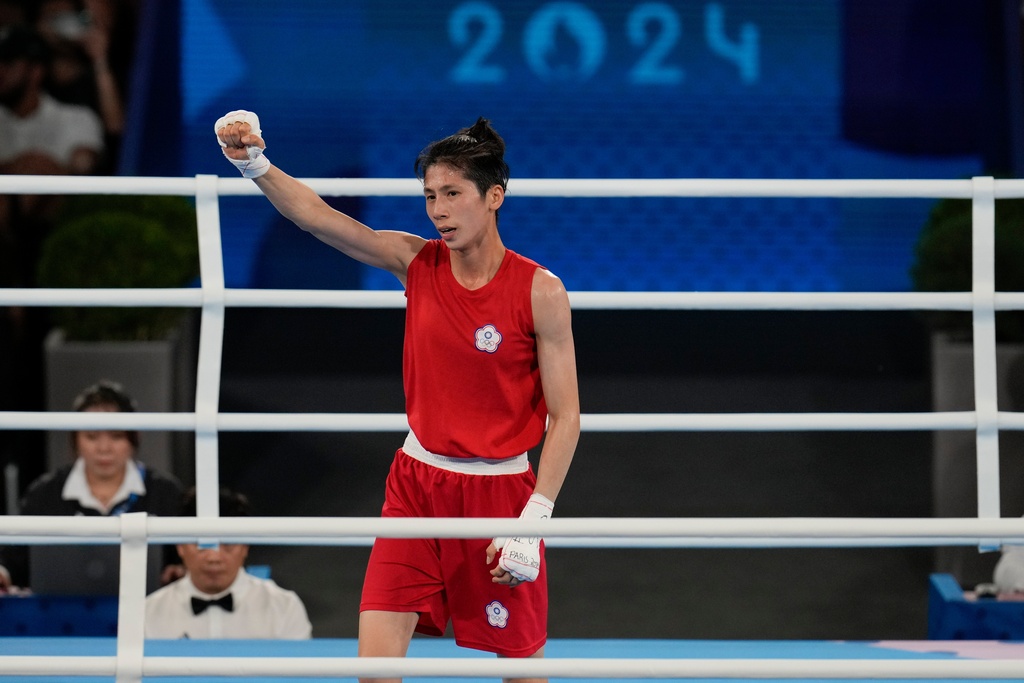 FILE - Taiwan's Lin Yu-ting celebrates after defeating Poland's Julia Szeremeta in their women's 57 kg final boxing match at the 2024 Summer Olympics, Saturday, Aug. 10, 2024, in Paris, France. (AP Photo/Ariana Cubillos, File)