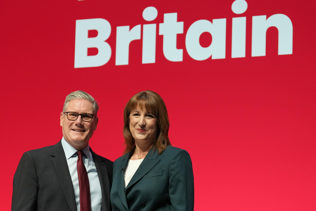 Britain's Chancellor of the Exchequer Rachel Reeves, left, stands next to the Prime Minister Keir Starmer, after she gave her keynote speech during the annual Labour Party conference in Liverpool, England, Monday, Sept. 29, 2025. (AP Photo/Jon Super)