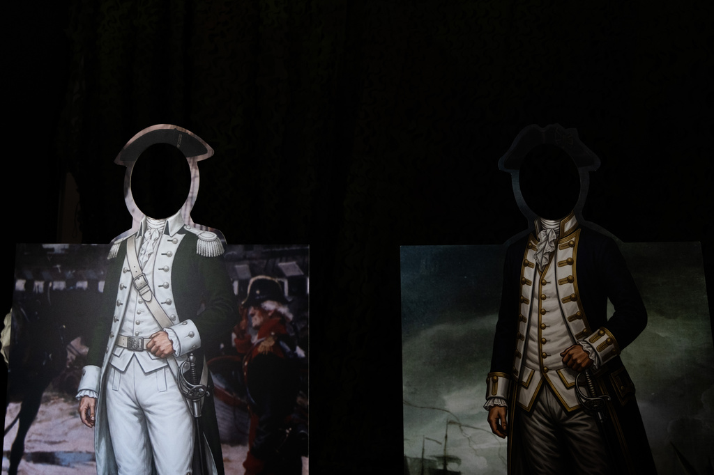 Cut outs of Founding Fathers at the Great American State Fair on the National Mall, Thursday, July 2, 2026, in Washington. (AP Photo/Allison Robbert)