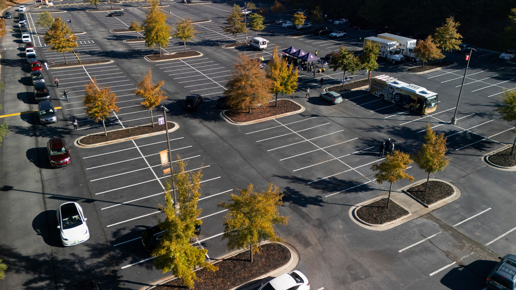 MUST Ministries delivers food to the public via a drive through service, Saturday, Nov. 1, 2025, in Austell. (AP Photo/Mike Stewart)