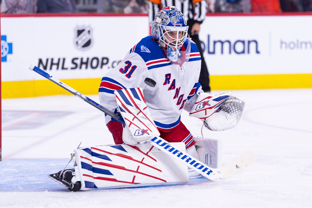 New York Rangers goalie Igor Shesterkin stops the shot during the second period of an NHL hockey game against the Philadelphia Flyers, Monday, March 9, 2026, in Philadelphia. (AP Photo/Chris Szagola)