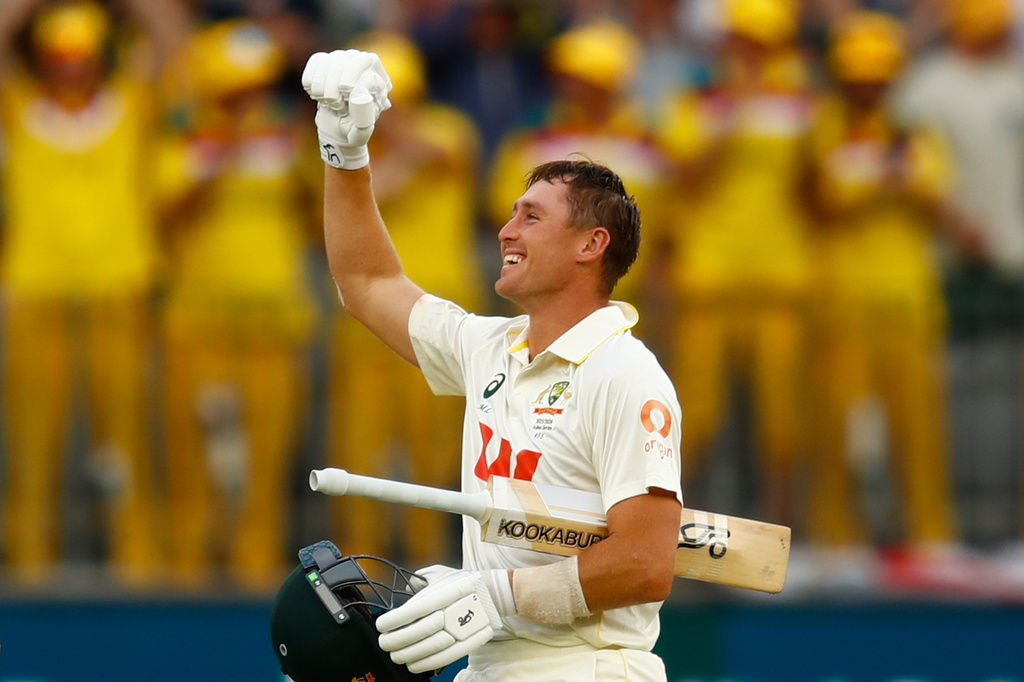 Australia's Marnus Labuschagne celebrates after Australia won the first Ashes cricket test match against England in Perth, Saturday, Nov. 22, 2025.(AP Photo/Gary Day)
