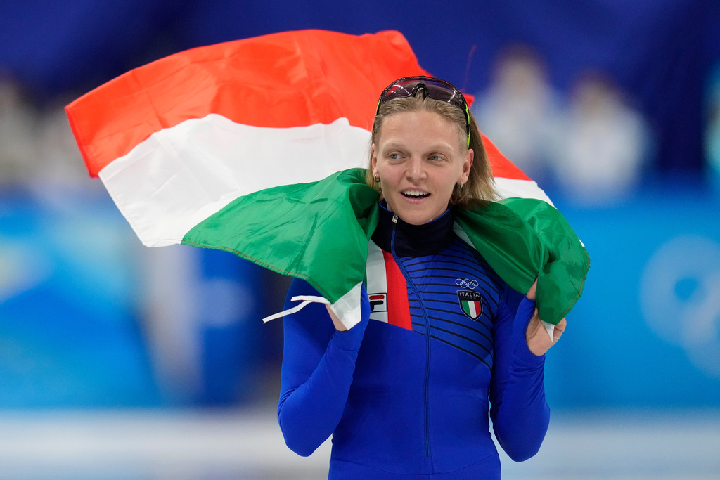FILE - Arianna Fontana of Italy, celebrates after her second place finish in the women's 1500-meters final during the short track speedskating competition at the 2022 Winter Olympics, Wednesday, Feb. 16, 2022, in Beijing. (AP Photo/Natacha Pisarenko, File)