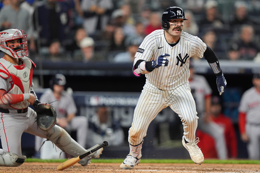 New York Yankees Austin Wells makes his way to first base after connecting for an RBI single to right field that allowed Jazz Chisholm Jr. to score the go-ahead run against the Boston Red Sox during the eighth inning of Game 2 of an American League wild-card baseball playoff series, Wednesday, Oct. 1, 2025, in New York. (AP Photo/Frank Franklin II) New York Yankees Austin Wells makes his way to first base after connecting for an RBI single to right field that allowed Jazz Chisholm Jr. to score the go-ahead run against the Boston Red Sox during the eighth inning of Game 2 of an American League wild-card baseball playoff series, Wednesday, Oct. 1, 2025, in New York. (AP Photo/Frank Franklin II)