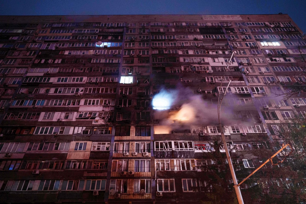 A residential building is damaged by a Russian strike on a residential neighborhood in Kyiv, Ukraine, on Friday, Oct. 10, 2025. (AP Photo/Evgeniy Maloletka)