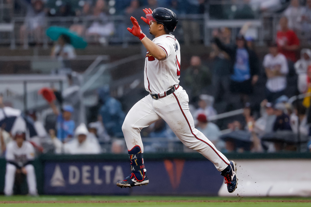 Atlanta Braves' Drake Baldwin reacts while running the bases after hitting a solo home run against the San Francisco Giants during the first inning of a baseball game, Tuesday, June 16, 2026, in Atlanta. (AP Photo/Erik S. Lesser)