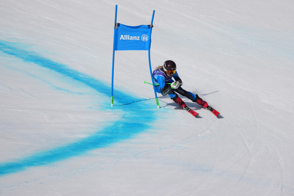 Varvara Voronchikhina, of Russia, competes in the alpine skiing women's super-G standing final at the 2026 Winter Paralympics, in Cortina d'Ampezzo, Italy, Monday, March 9, 2026. (AP Photo/Evgeniy Maloletka)