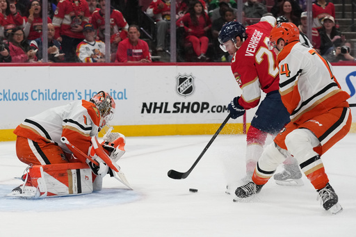 Anaheim Ducks goaltender Lukas Dostal (1) defends a shot by Florida Panthers center Carter Verhaeghe (23) during the second period of an NHL hockey game, Tuesday, Oct. 28, 2025, in Sunrise, Fla. (AP Photo/Lynne Sladky) Anaheim Ducks goaltender Lukas Dostal (1) defends a shot by Florida Panthers center Carter Verhaeghe (23) during the second period of an NHL hockey game, Tuesday, Oct. 28, 2025, in Sunrise, Fla. (AP Photo/Lynne Sladky)