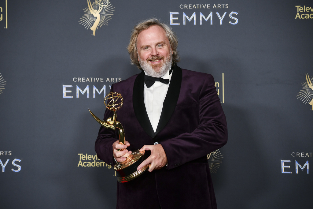 CORRECTS YEAR - Yan Miles poses in the press room with the award for outstanding picture editing for a drama series for "Andor" during night one of the Creative Arts Emmy Awards on Saturday, Sept. 6, 2025, in Los Angeles. (Photo by Richard Shotwell/Invision/AP)