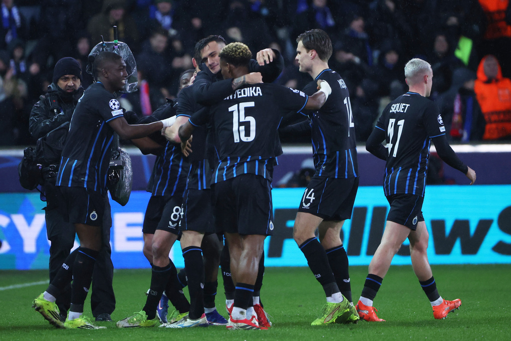 Brugge's team celebrate after Christos Tzolis scored his side's third goal during the Champions League play-off first leg soccer match between Club Brugge and Atletico Madrid, in Bruges, Belgium, Wednesday, Feb. 18, 2026. (AP Photo/Omar Havana)