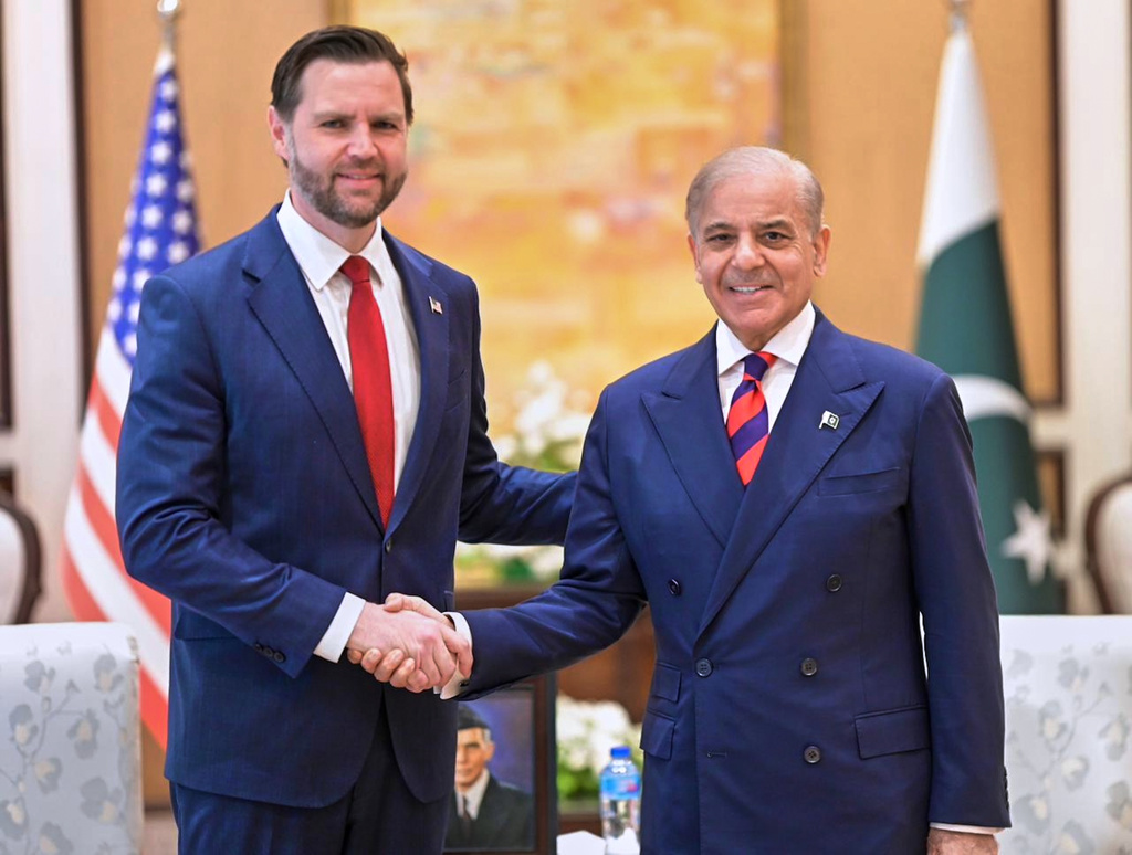 In this photo released by the Pakistan Prime Minister Office, U.S. Vice President JD Vance, left, shakes hand with Pakistani Prime Minister Shehbaz Sharif prior to their meeting, in Islamabad, Pakistan, Saturday, April 11, 2026 (Pakistan Prime Minister Office via AP)